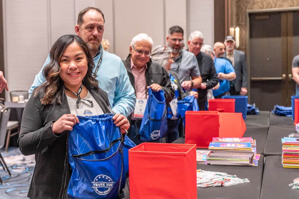 Volunteers prepared 200 assembled drawstring bags with games, books and personal care products.